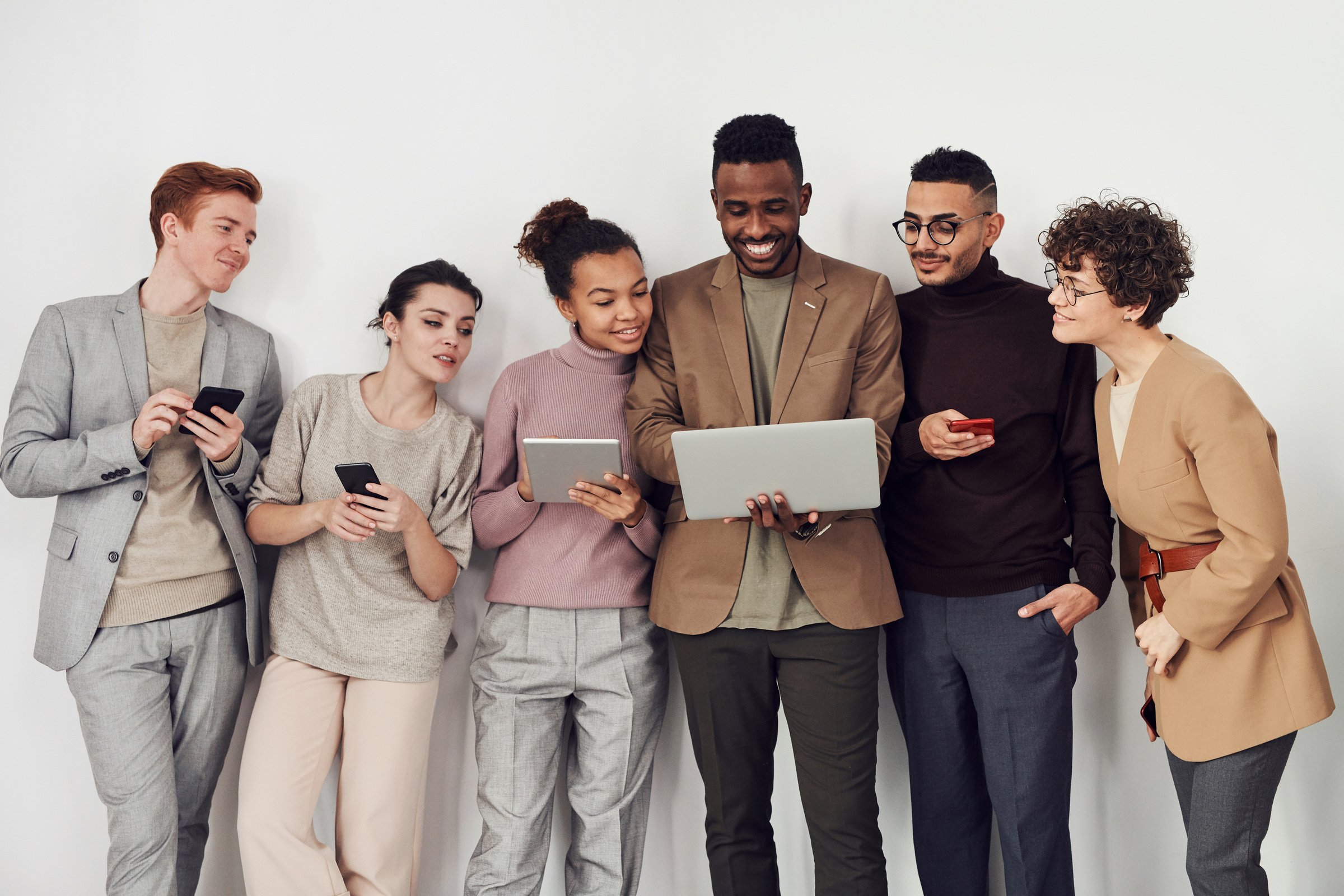 Group of People Looking at Laptop Screen